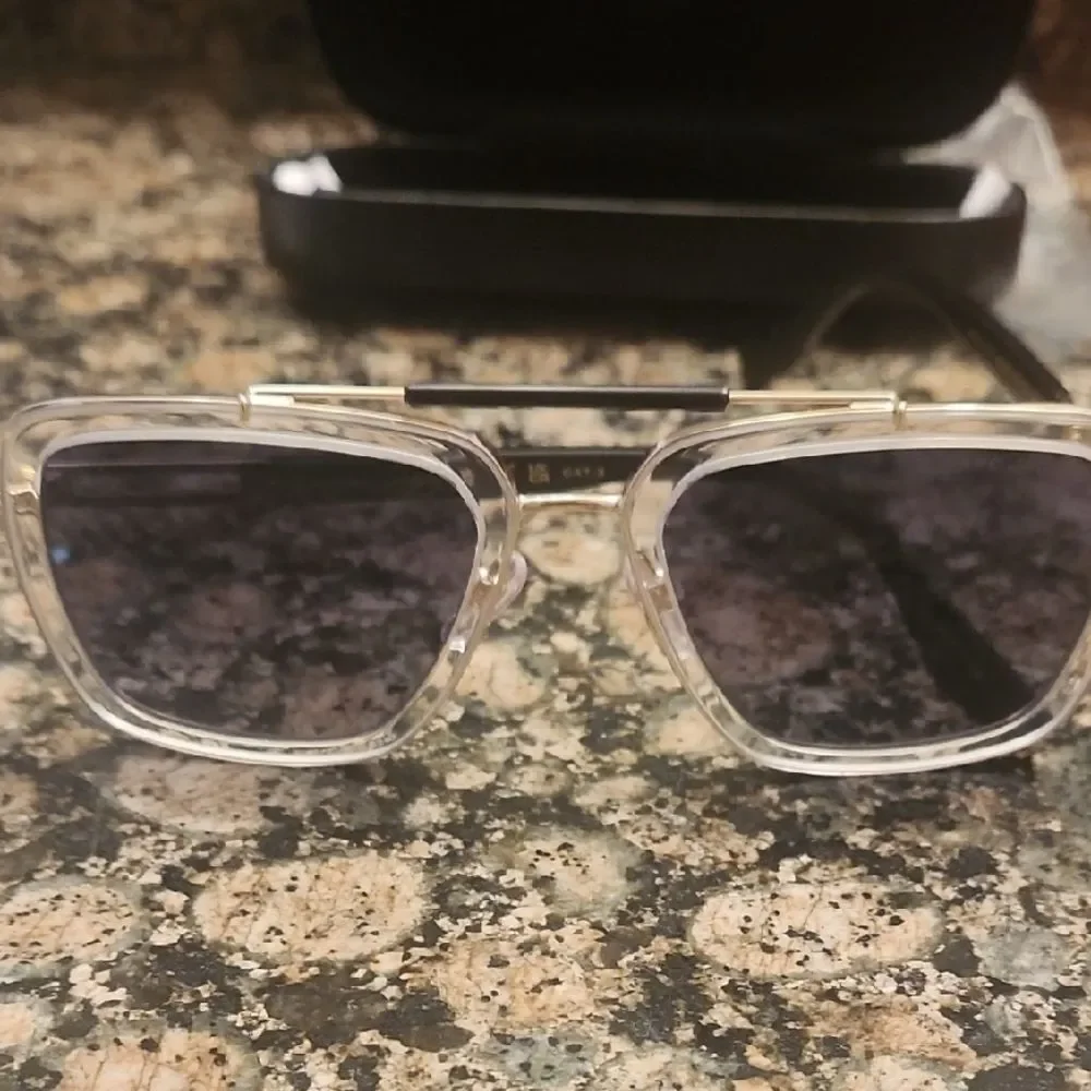 Marc Jacobs Transparent Frame Sunglasses with Dark Lenses